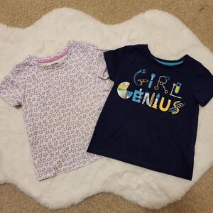 Spotted Zebra navy blue tee saying "girl genius", white tee with purple stars